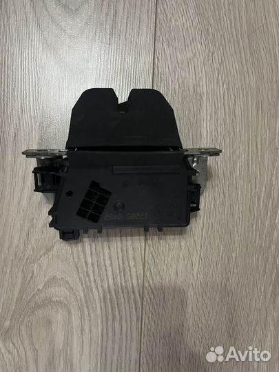 Замок багажника opel astra h gtc