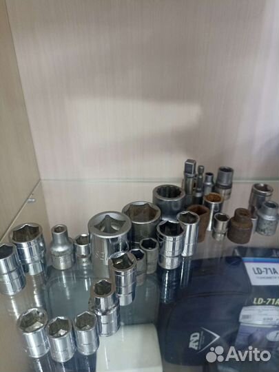 А) Набор головок