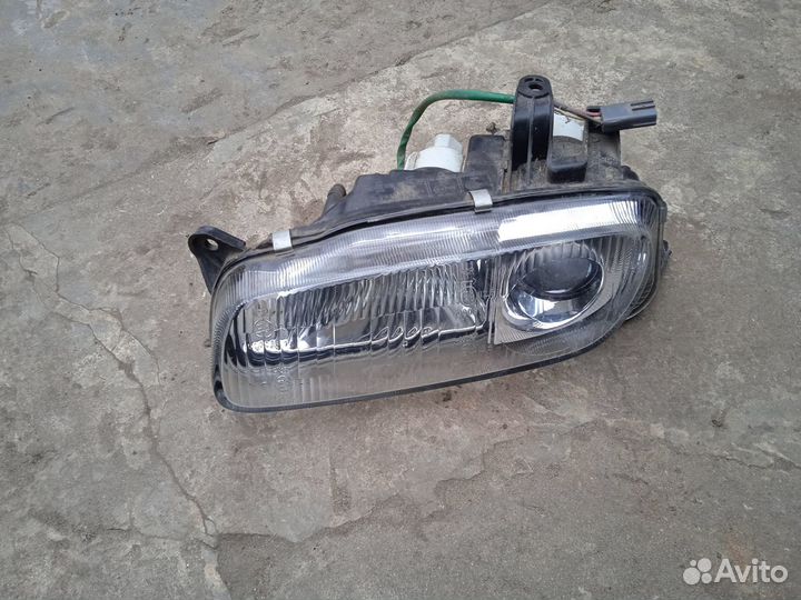 Фара mazda 323f BA