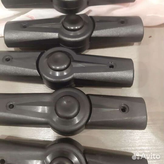 Механизмы регулировки ручки коляски и капюшона