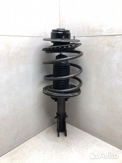 Амортизатор стойка передний левый Dodge Caravan 4