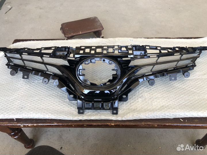 Верхняя решетка Камри 70