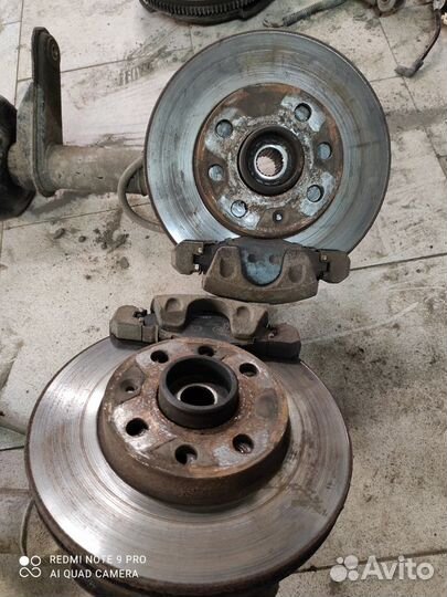 Кулак поворотный, амортизатор Chevrolet Lanos