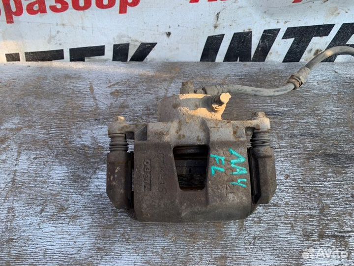 Суппорт тормозной передний левый Chevrolet Lacetti