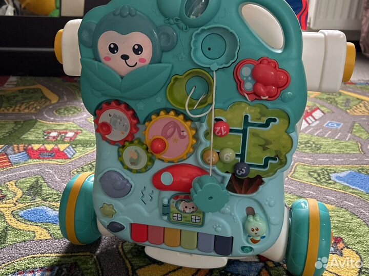 Развивающий автомобиль ходунки каталка