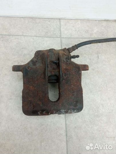 Суппорт тормозной передний левый Renault Espace 3