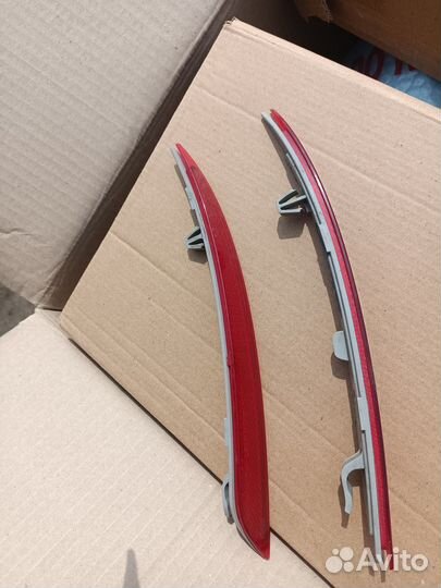 Отражатель в бампер задний левый.правый Ford Mond