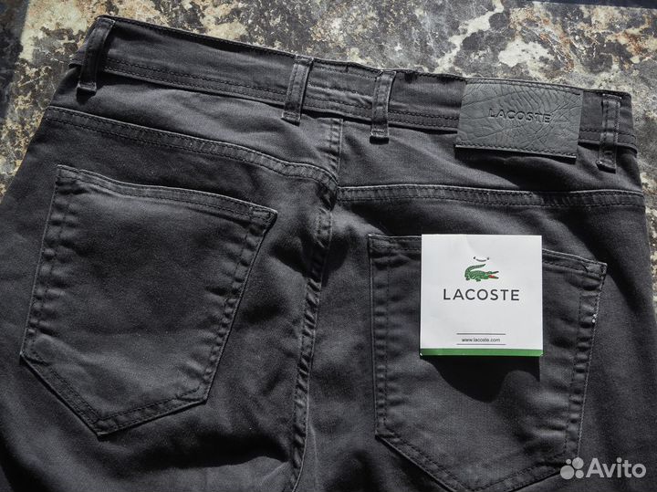 Продам джинсы черные Lacoste