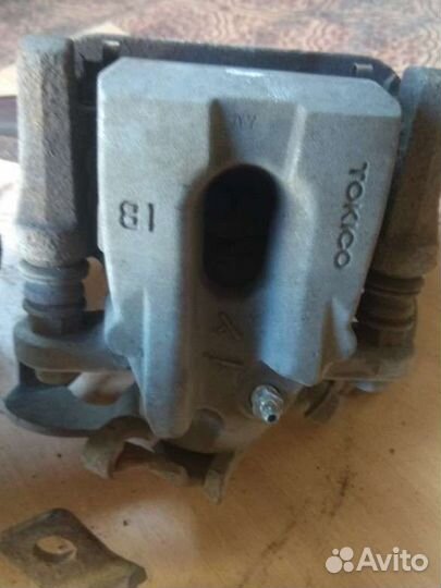 Суппорт задний Тойота Королла 150 Аурис