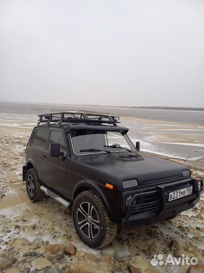 Силовые бампера с электролебёдкой и фаркопом Нива