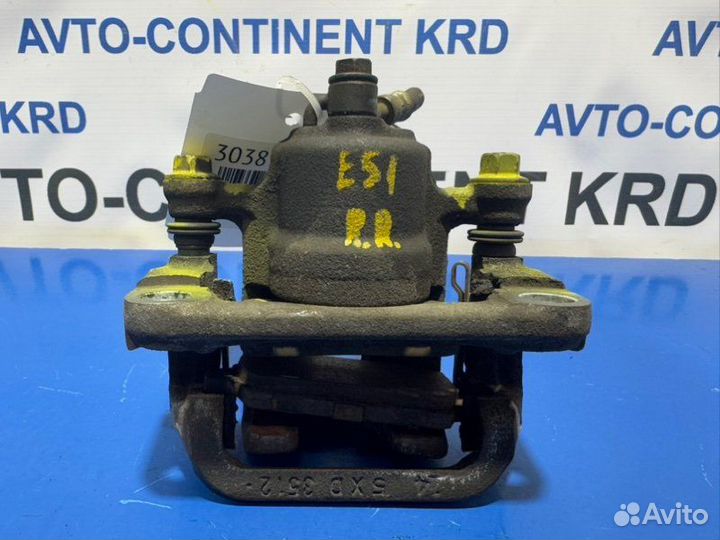 Суппорт тормозной задний правый Nissan Elgrand E51