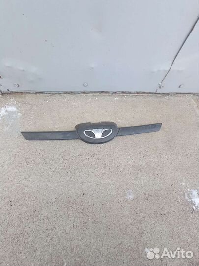 Daewoo Nexia эмблема решётки радиатора