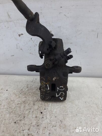 Суппорт тормозной задний левый Kia Cerato хэтчбэк