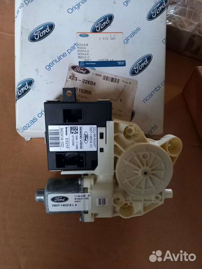 Моторчик стеклоподъемника задний правый Ford Focus