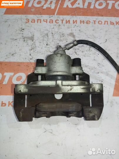 Суппорт тормозной передний правый Volkswagen Caddy