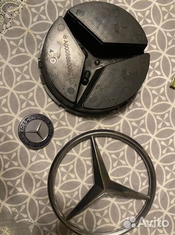 Знак на решетку и значок на капот