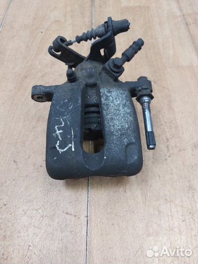 Тормозной суппорт задний левый Opel Insignia