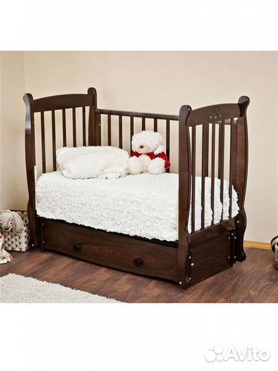Детская кроватка с продольным маятником
