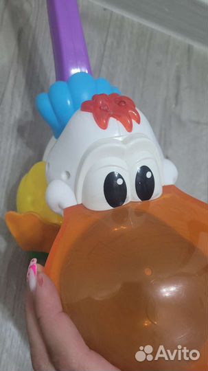 Каталка пеликан поющая