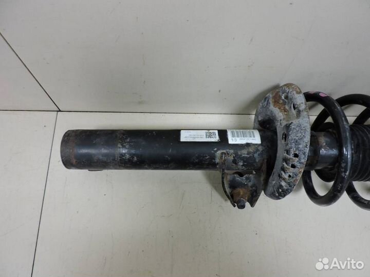 Амортизатор передний левый Skoda Yeti 2009