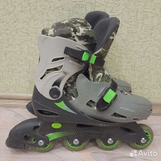 Роликовые коньки