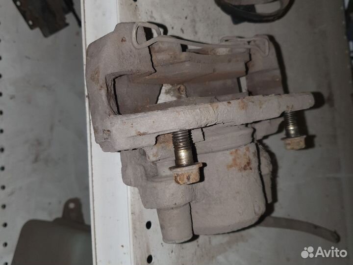 Суппорт тормозной Киа shuma R.L