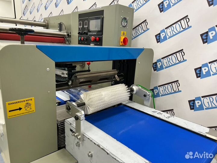 Горизонтальный упаковщик 600(флоупак) с верхней п