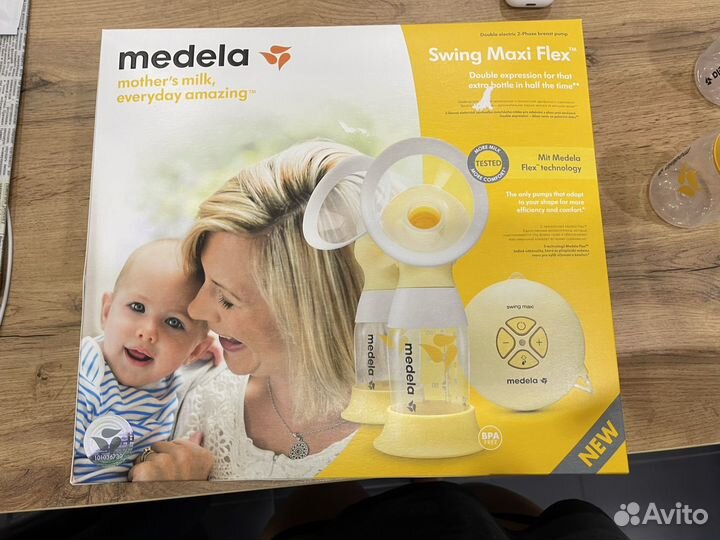 Молокоотсос medela swing maxi flex