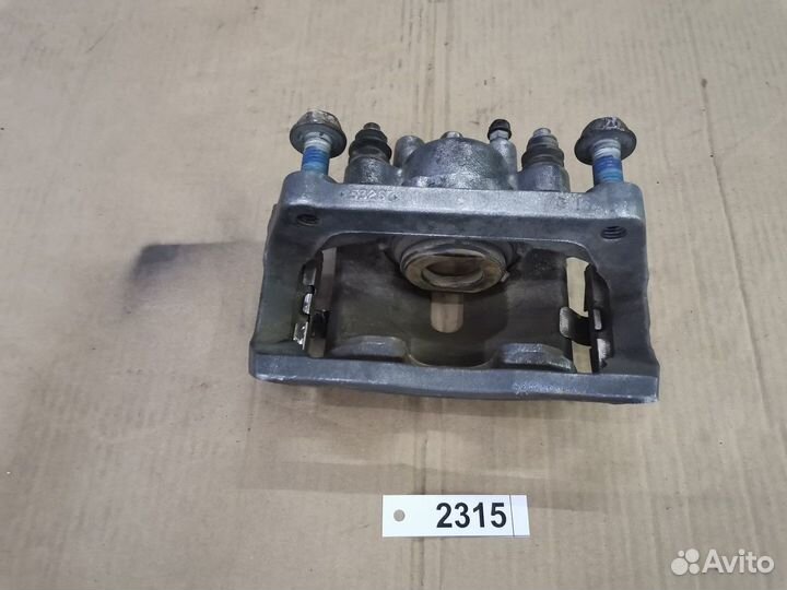 Суппорт задний левый