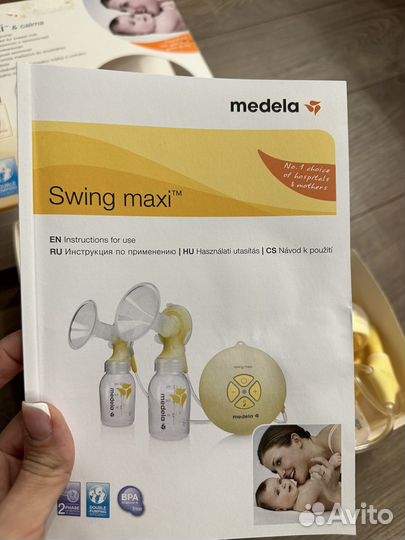 Молокоотсос medela swing maxi flex