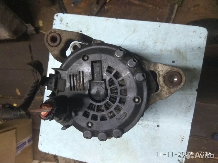 Генератор на Опель Астра J 2014 год