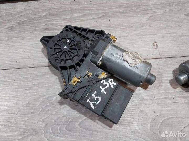 Моторчик стеклоподьемника задний VW Passat B5