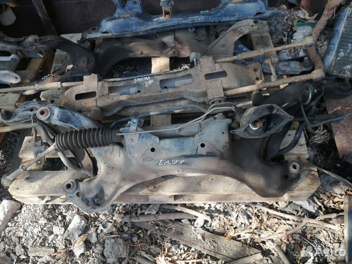 Подрамник рулевая рейка на laser familia