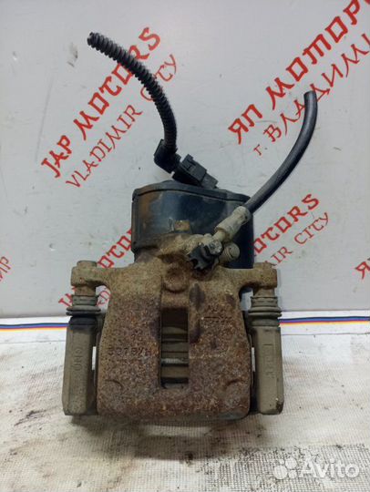 Суппорт тормозной задний правый Volkswagen Tiguan