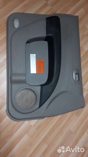 Mitsubishi l200 обшивка двери передняя левая