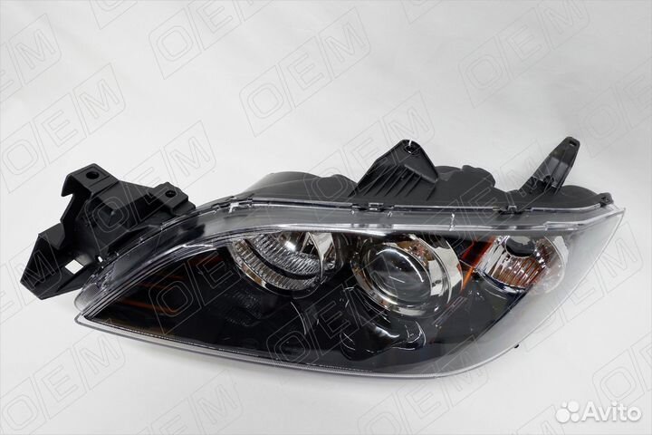 Фара левая Mazda 3 1 вк 2003-2009