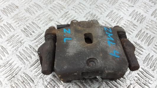 Суппорт тормозной задний левый mitsubishi pajero 3