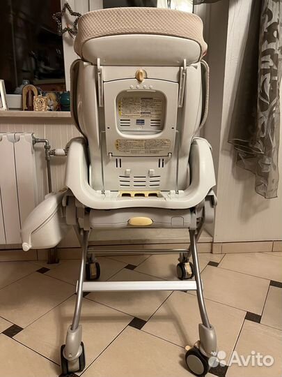 Стульчик-колыбель Cоmbi Roanju (Япония)