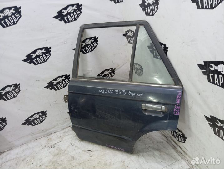 Дверь задняя левая Mazda 323