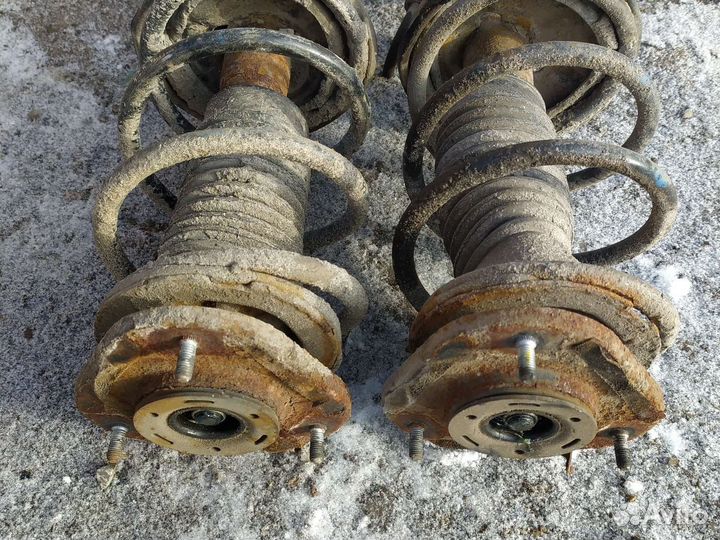 Передние стойки toyota corolla e120