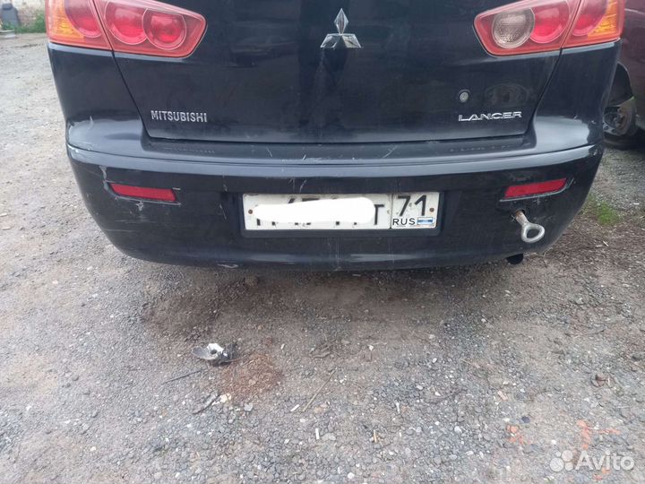 Задний бампер Mitsubishi Lancer 10