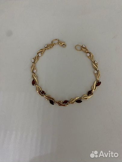Золотой браслет с камнями