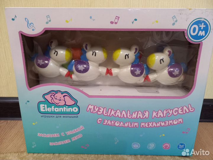 Музыкальная карусель с заводным механизмом