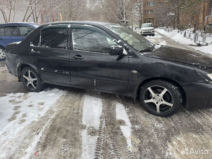 Mitsubishi Lancer 1.3 МТ, 2006, 325 800 км