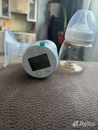 Молокоотсос электрический новый