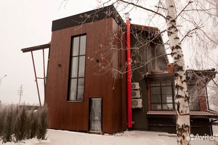 Отделка фасада деревом