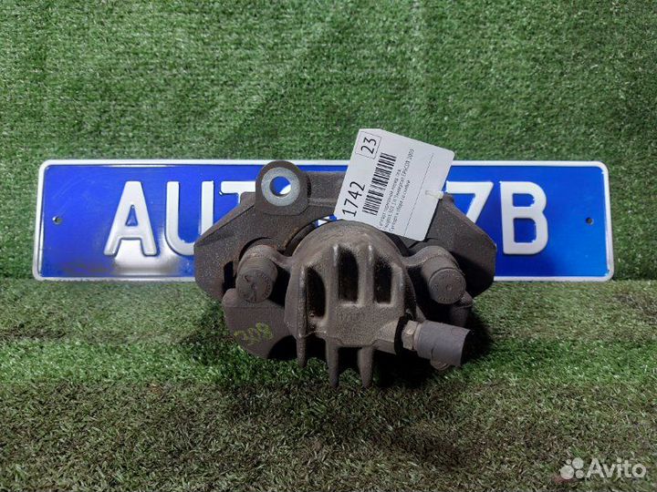 Суппорт тормозной передний левый Peugeot 308 Sw