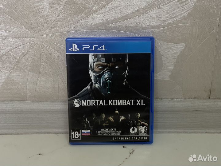 Диск с игрой на PlayStation Mortal Kombat XL