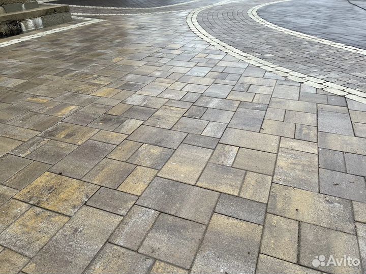 Кладка тротуарной плитки брусчатки