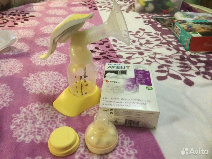 Молокоотсос weleda с бутылочкой и пакетами для сте